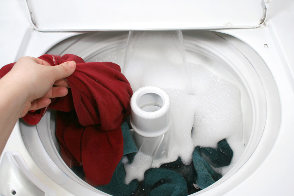 how to get rid of soap suds in washing machine